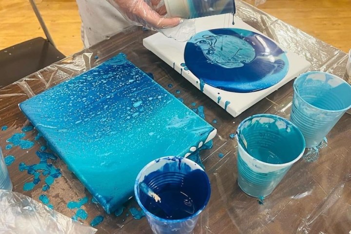 a blue and white cake on a table