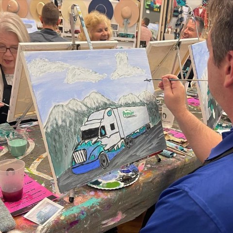 a group of people sitting at a table