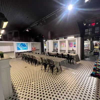 a group of people waiting at a train station