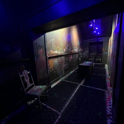 a purple light in a dark room