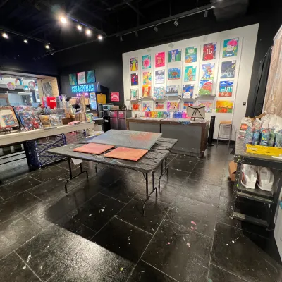 a group of people walking in the rain