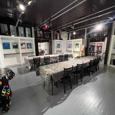 a group of people sitting at a train station