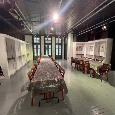 a group of people sitting at a train station