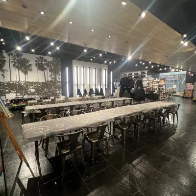 a group of people sitting at a train station