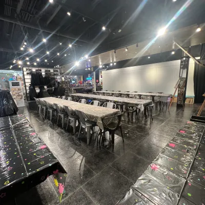 a group of people that are standing in the rain