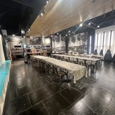 a group of people walking in the rain