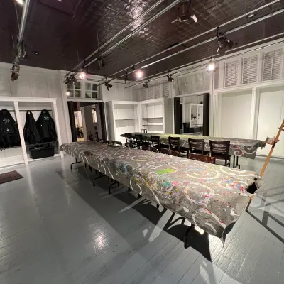 a group of people standing in front of a building